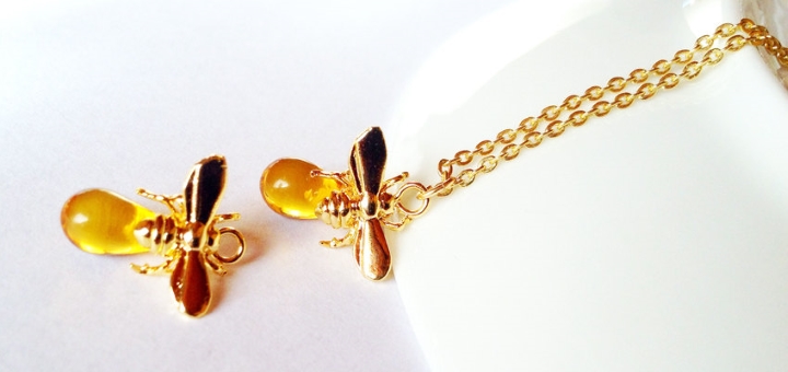 Gold-filled honey bee necklace at Qmuro